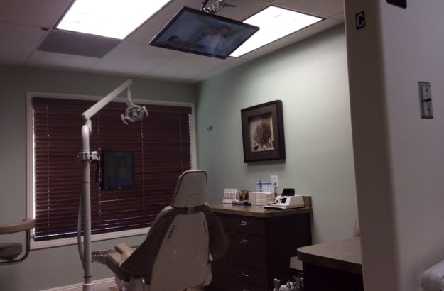 view of dental chair and some equipment