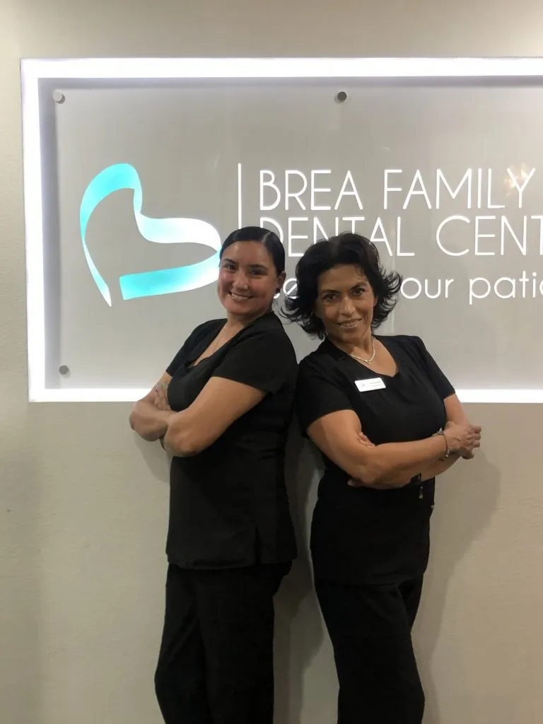 nancy and Inez - two dental assistants posing together
